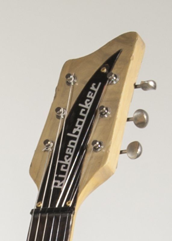The headstock of a rickenbacker electric guitar