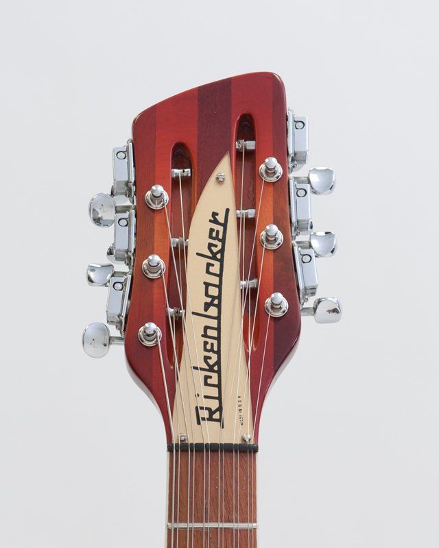 The headstock of a rickenbacker guitar is shown