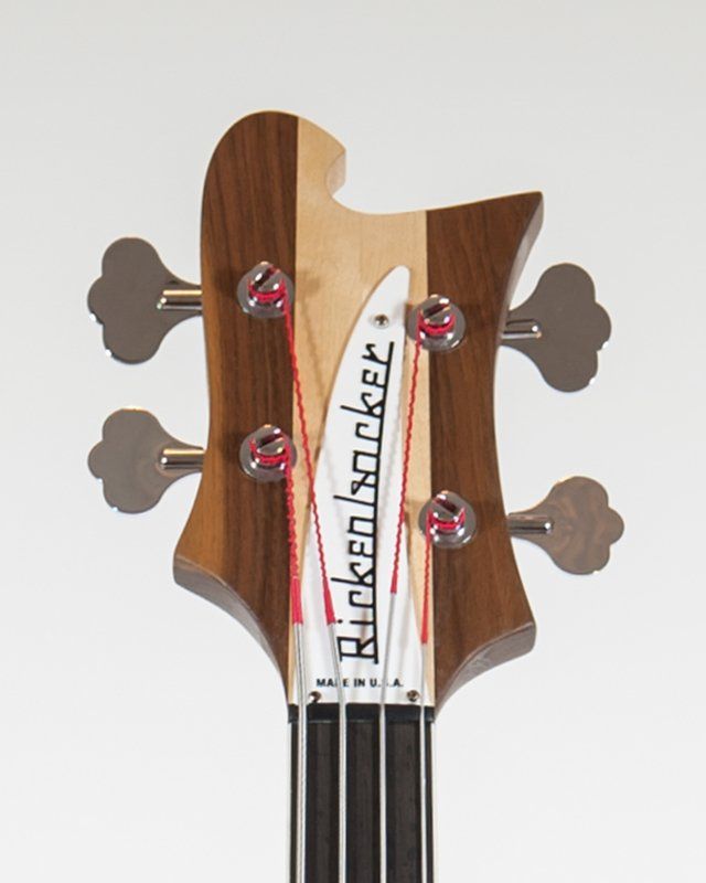 The headstock of a rickenbacker bass guitar