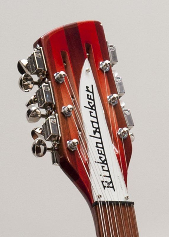 A close up of a rickenbacker guitar headstock