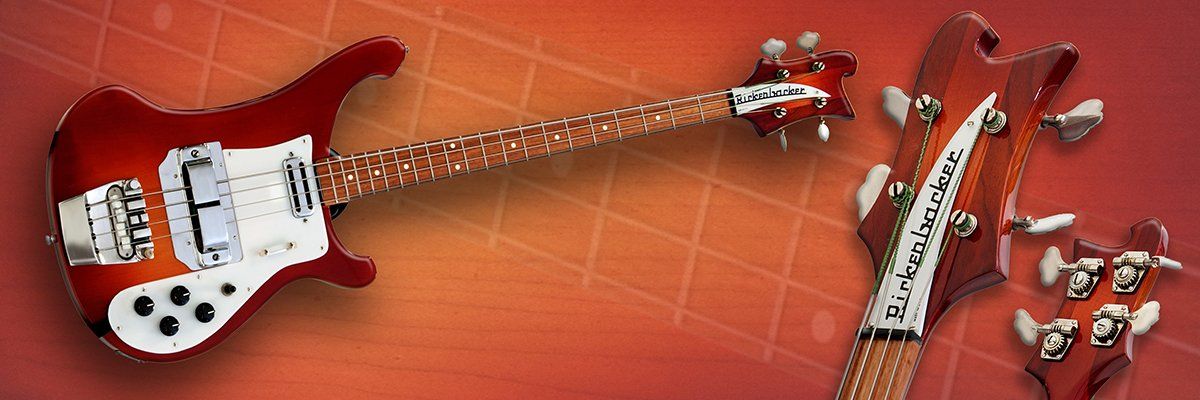 A red and white electric guitar is sitting on a red background.