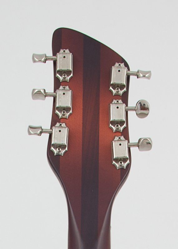 A close up of the headstock of a guitar