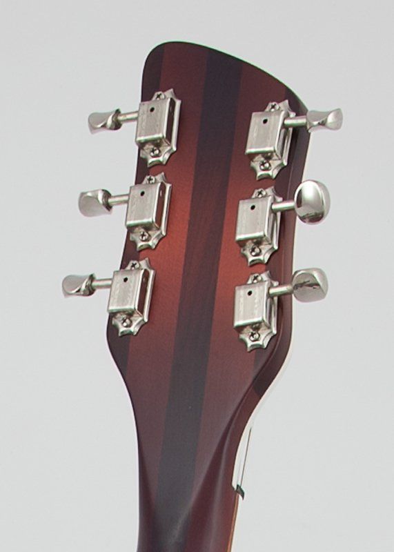 A close up of the headstock of a guitar