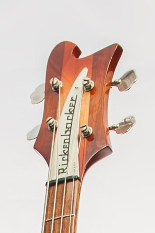 The headstock of a rickenbacker bass guitar