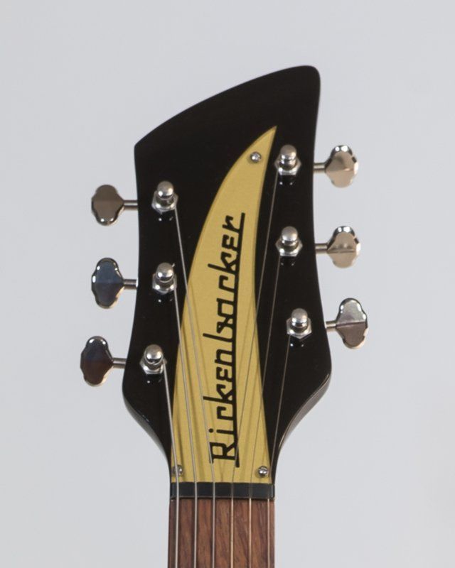The headstock of a rickenbacker electric guitar