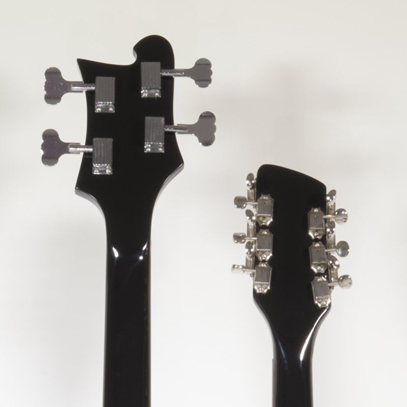A close up of a guitar headstock and neck