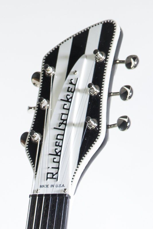 A black and white rickenbacker guitar headstock