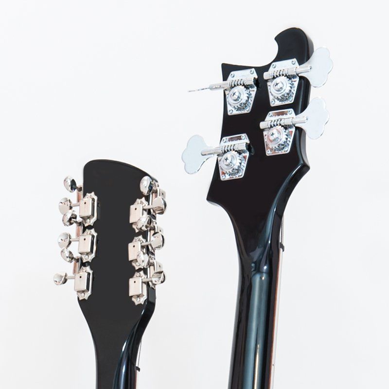 A close up of a guitar headstock and neck