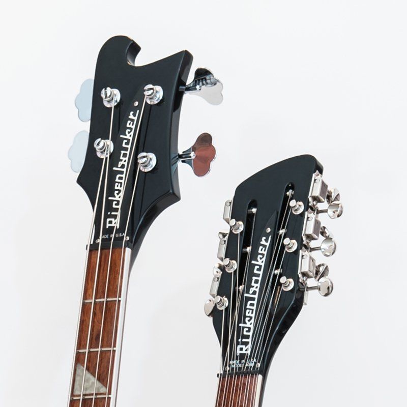 A rickenbacker bass guitar and a rickenbacker guitar headstock