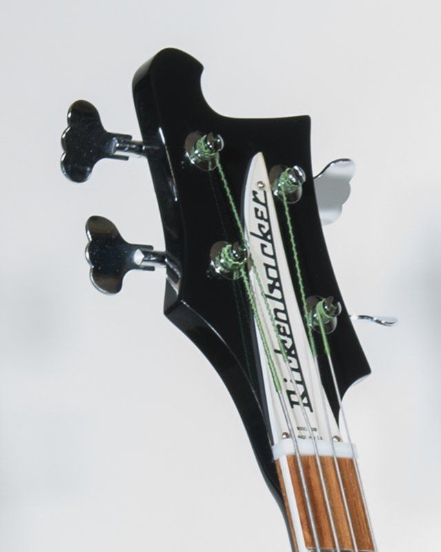 The headstock of a rickenbacker bass guitar