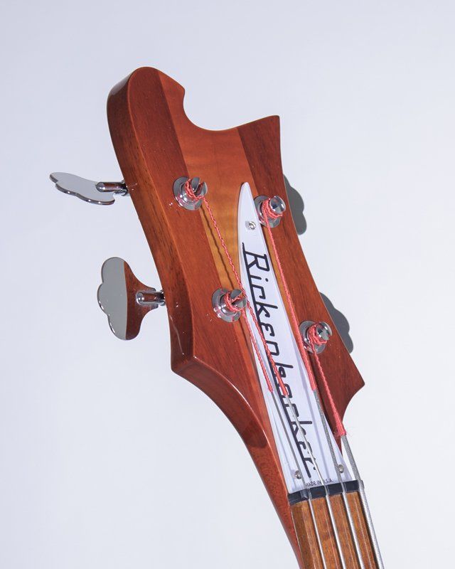 The headstock of a rickenbacker bass guitar