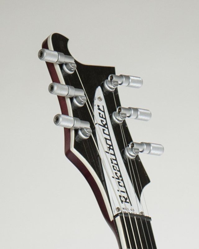 The headstock of a rickenbacker electric guitar
