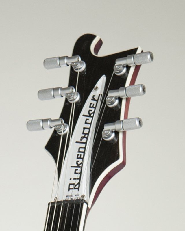 The headstock of a rickenbacker electric guitar