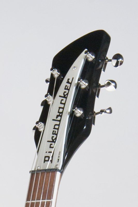 The headstock of a rickenbacker electric guitar
