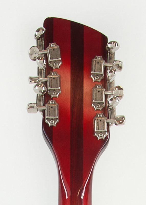 A close up of the headstock of a guitar