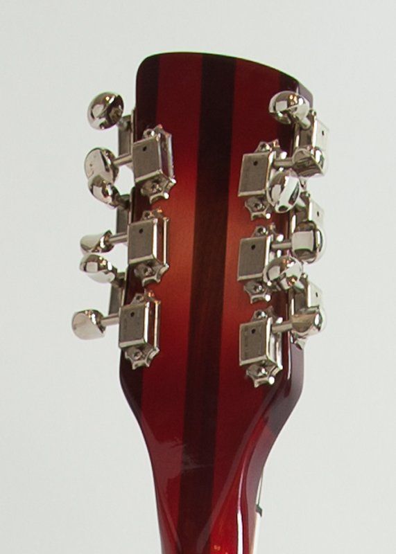 A close up of the headstock of a guitar