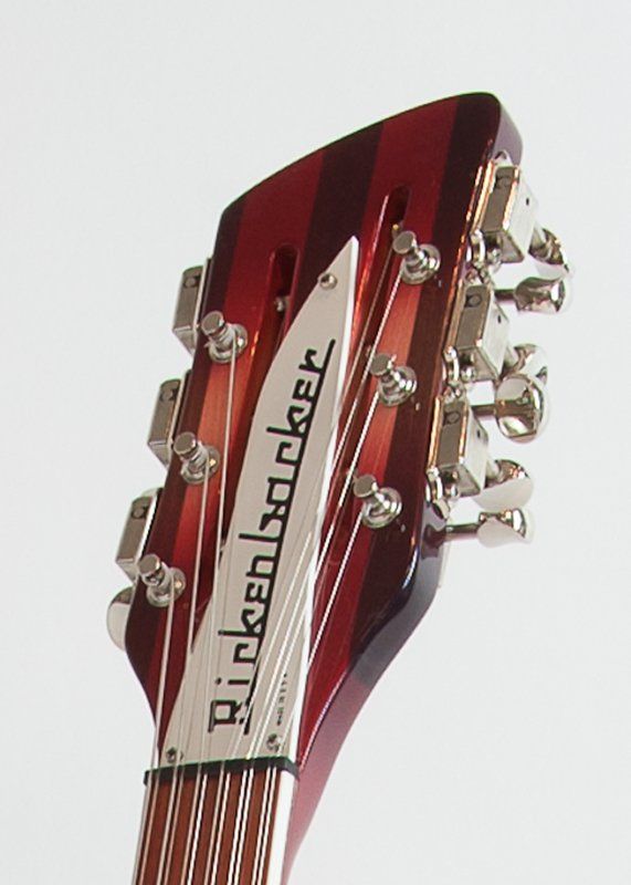 A close up of a rickenbacker guitar headstock