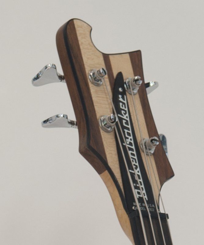 The headstock of a rickenbacker bass guitar