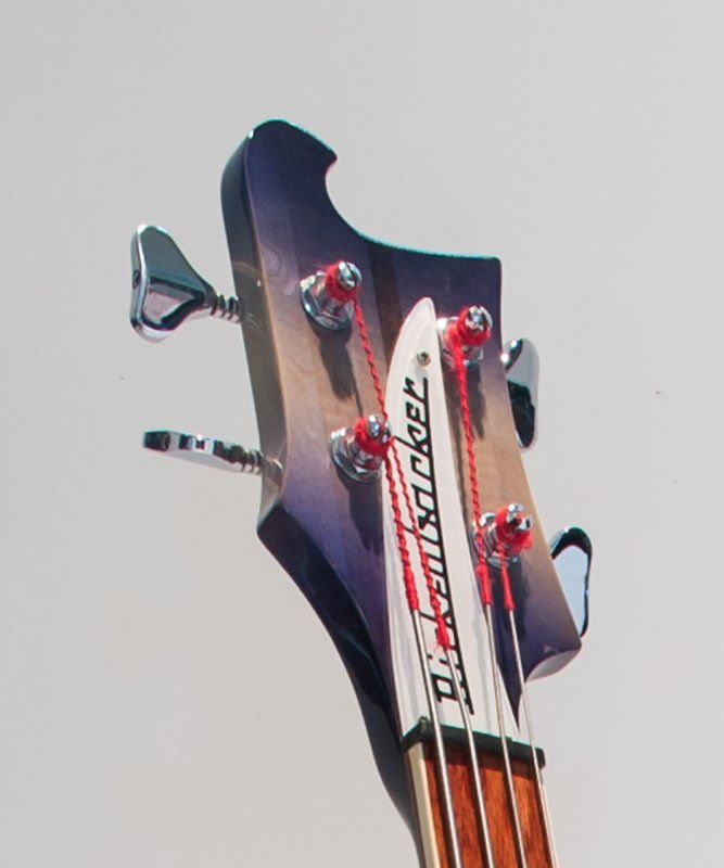 The headstock of a rickenbacker bass guitar