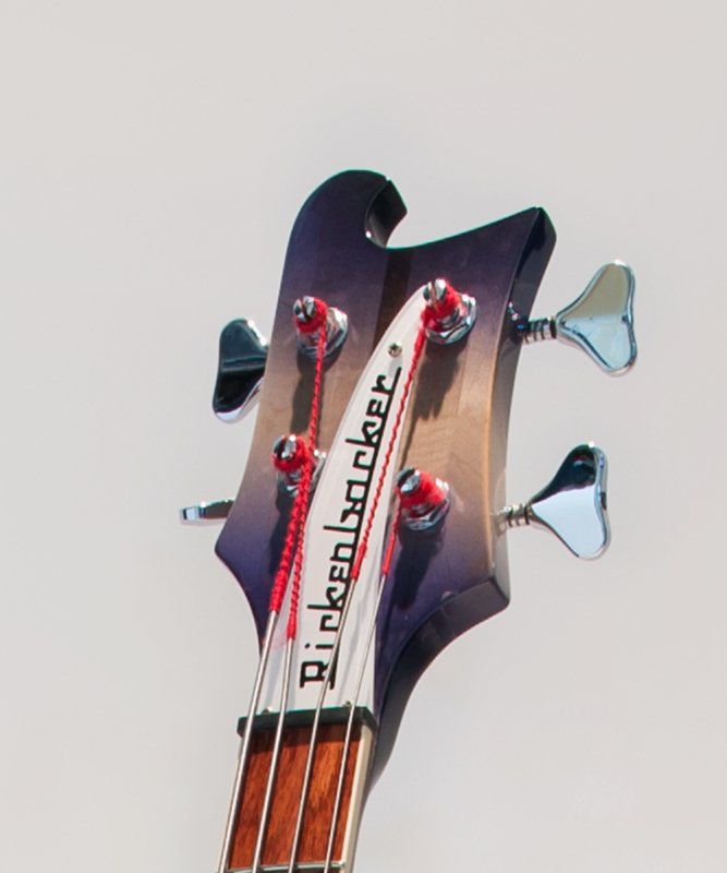 The headstock of a rickenbacker bass guitar