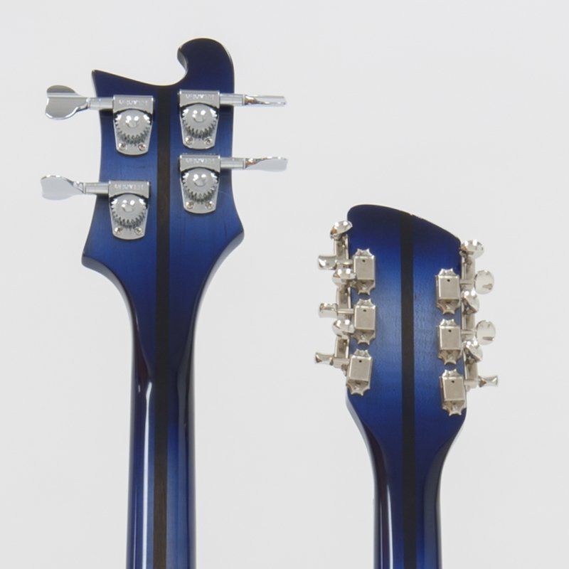 A close up of a blue guitar headstock and neck