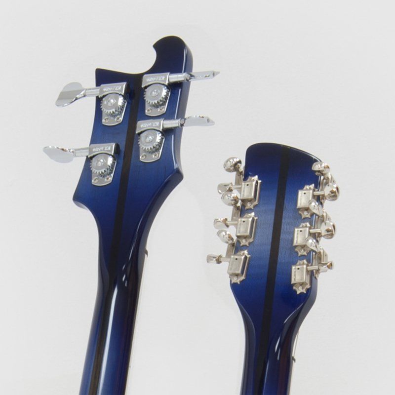 A close up of the back of a blue guitar