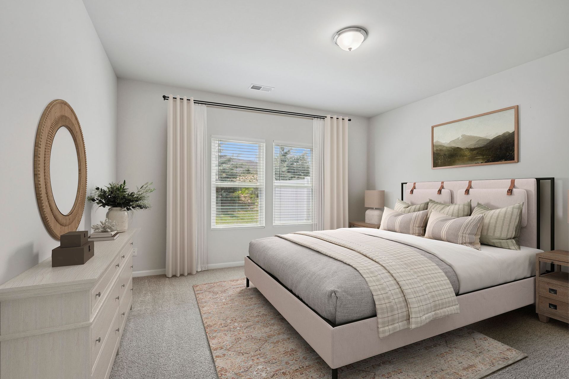 Bedroom with bed, dresser, mirror, window, and neutral decor.