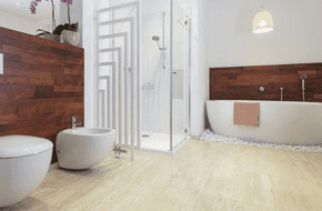 A white and wood effect bathroom