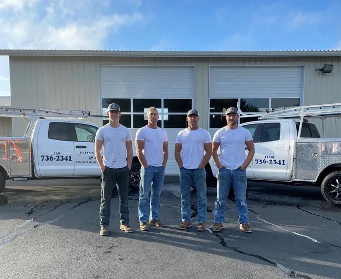 Johnson & Johnson Overhead Door INC team of professional garage door technicians