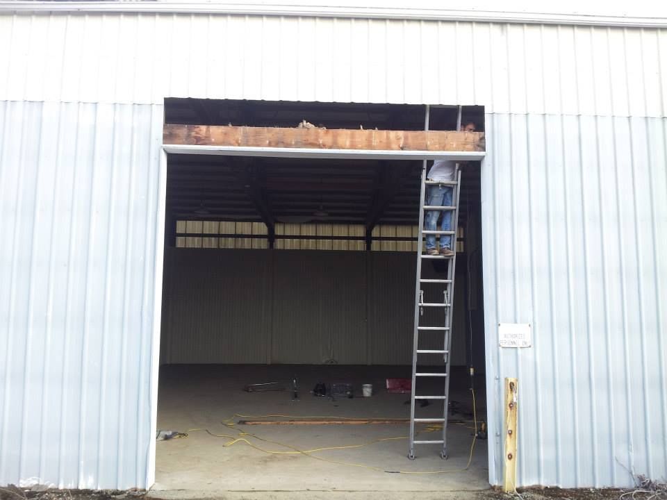 Commercial garage door installation process  performed by Johnson & Johnson Overhead Door INC in Thurston County, WA
