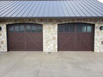 Double car garage with contemporary doors installed by Johnson & Johnson Overhead Doors INC in Toledo, WA