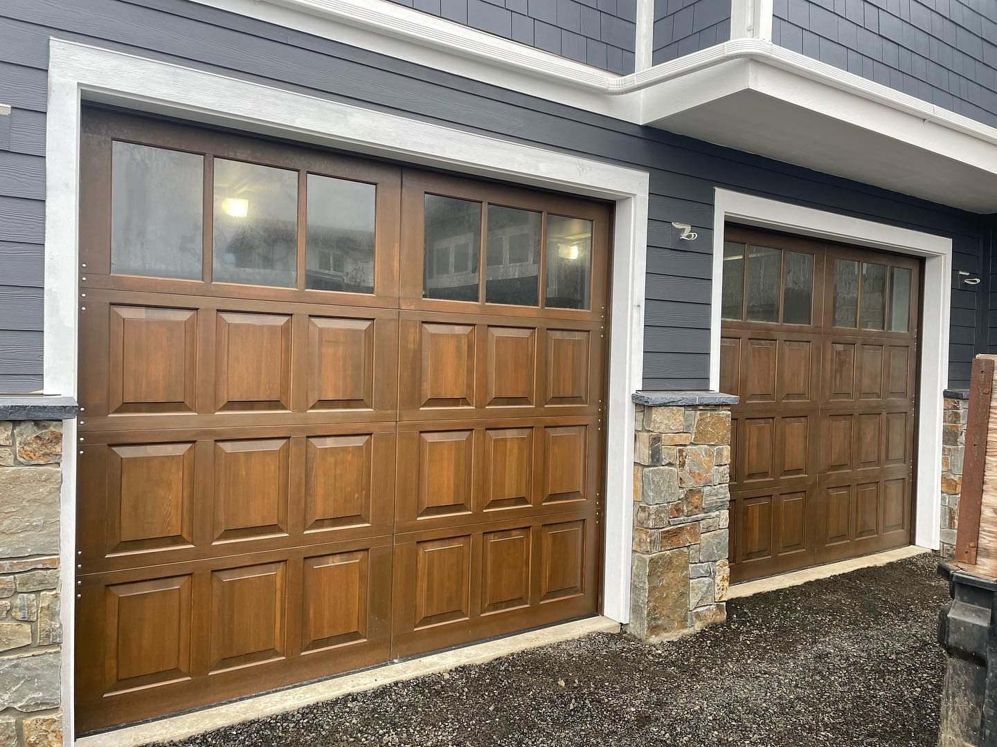 Classic double car garage door installation performed by Johnson & Johnson Overhead Door INC