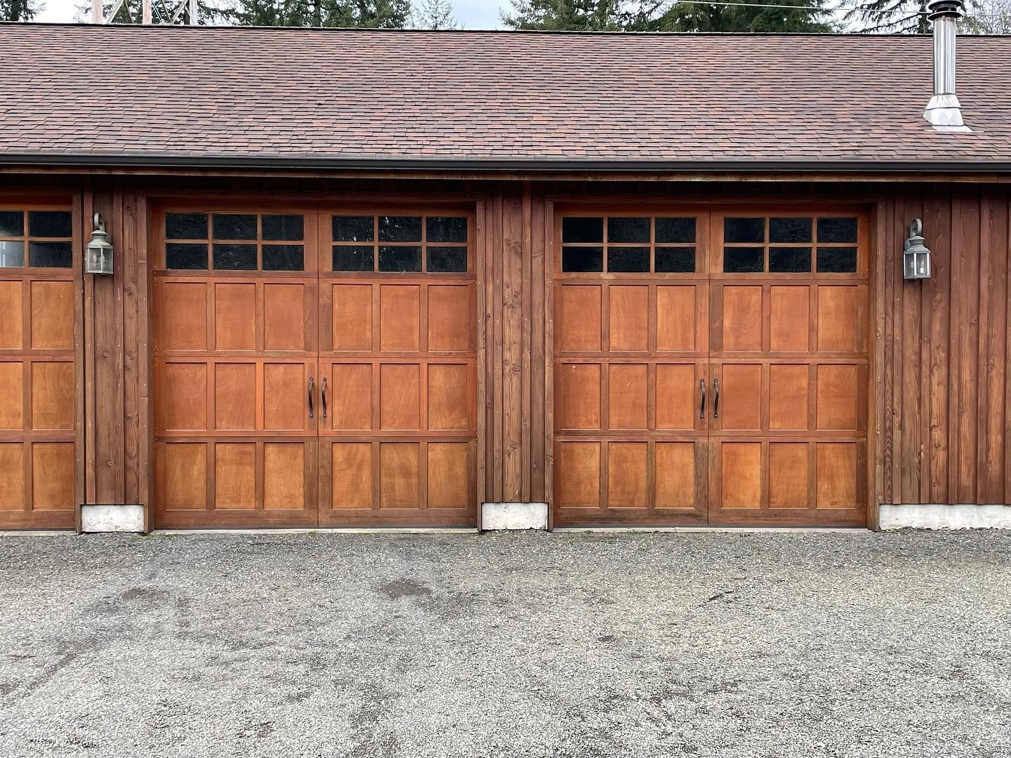 Double wood garage doors on residential detached garage
