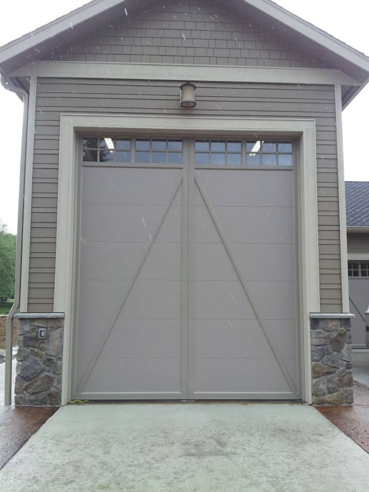 Tall residential garage door with vertical panel design