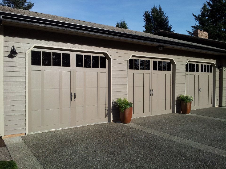 Three car garage door installation in Olympia, WA provided by Johnson & Johnson Overhead Door