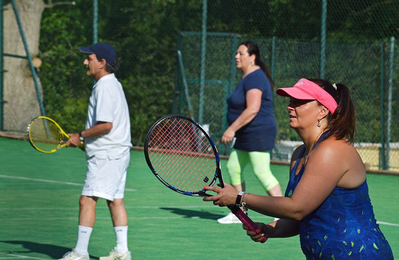 An image of tennis players at Pinner Lawn Tennis Club