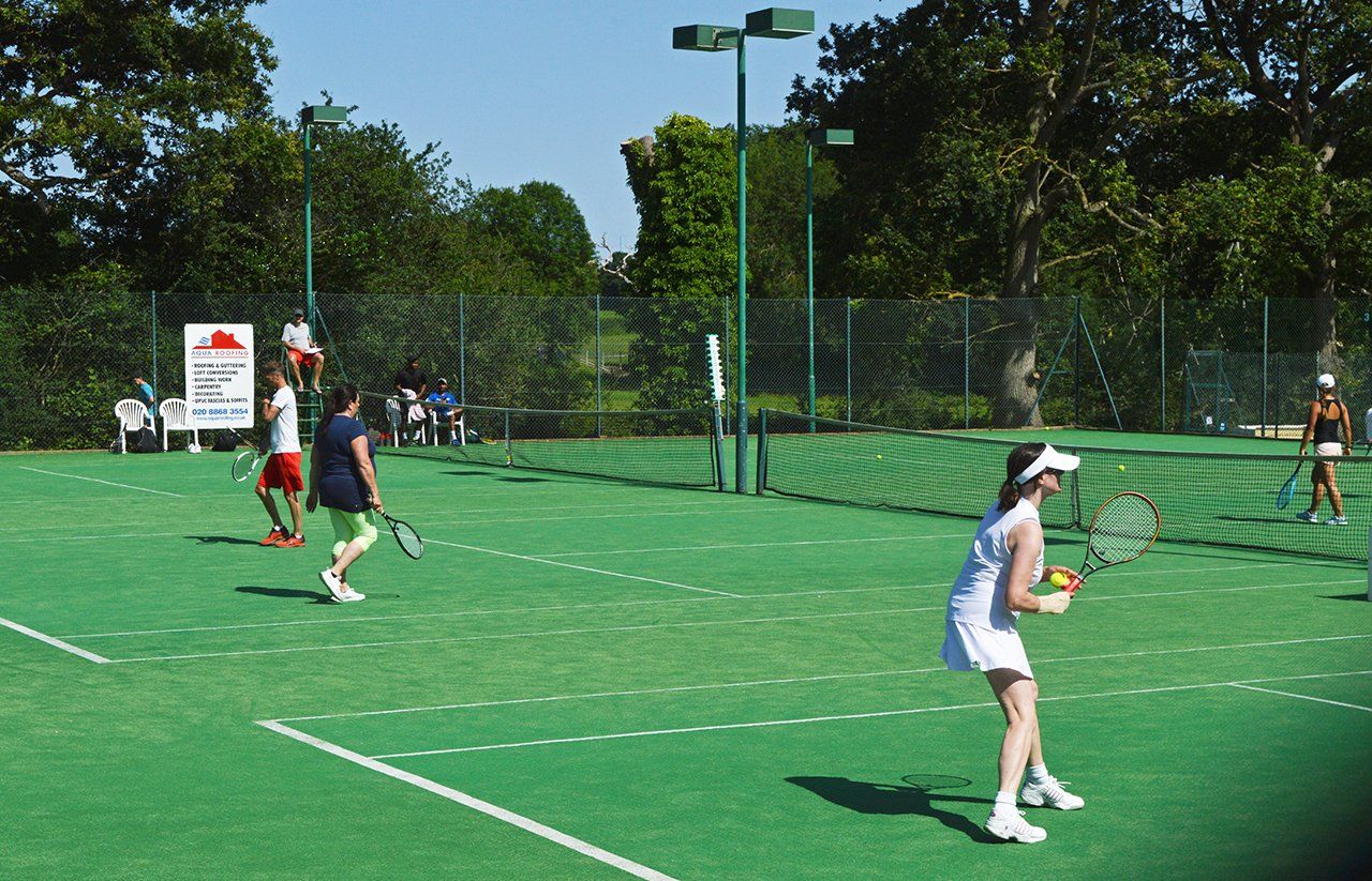 An image of tennis players at Pinner Lawn Tennis Club