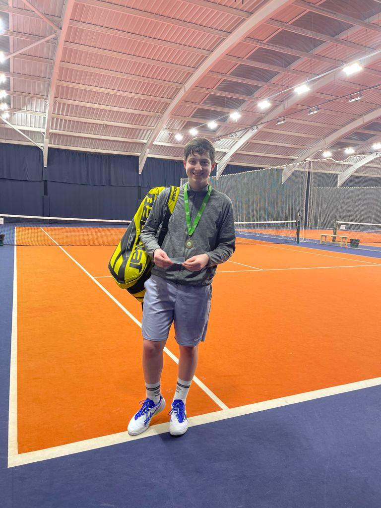 Photo of Gabriel Kuras after winning a tournament at the Central & East Tour