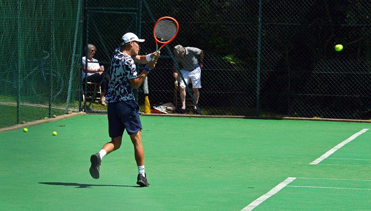Club member playing at Pinner Lawn Tennis Club