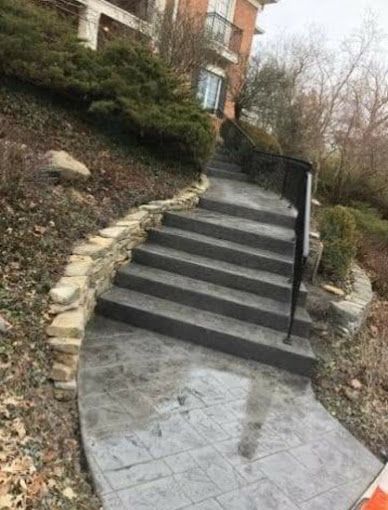 A set of stairs leading up to a house.