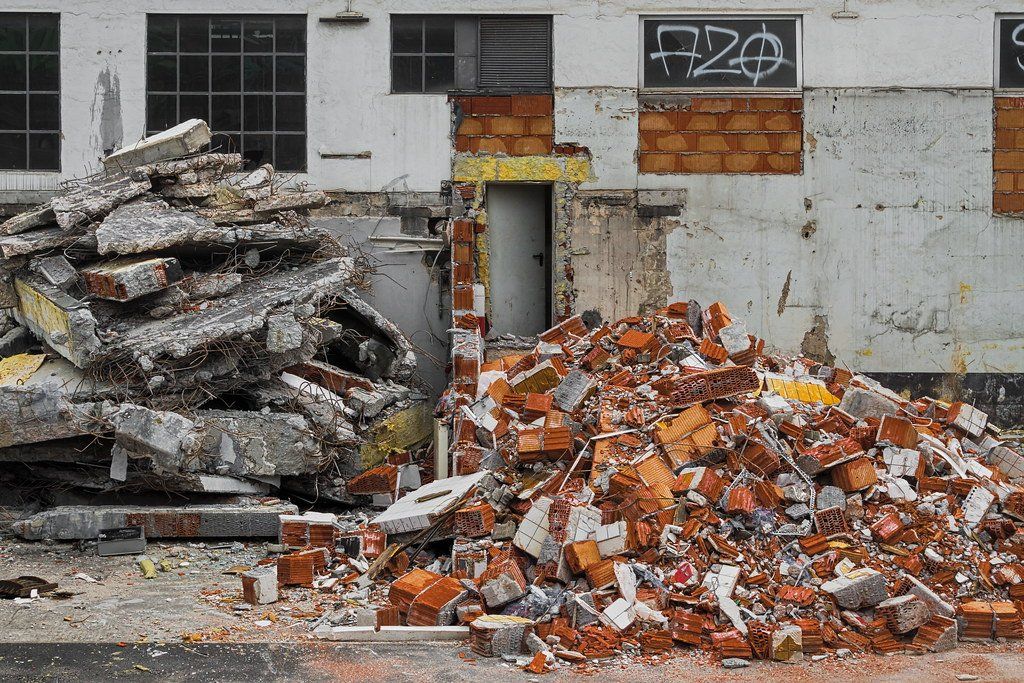 Large Piles of brick, tiling, and concrete from a recent demolition project
