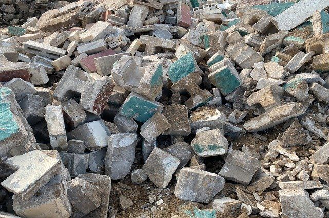 Pile of construction debris, mostly demolished concrete blocks