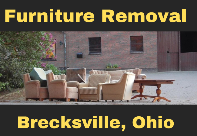 pile of furniture in someone's driveway that reads furniture removal brecksville, ohio