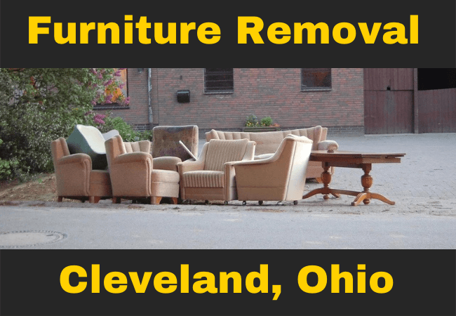 pile of furniture in someone's driveway that reads furniture removal cleveland, ohio