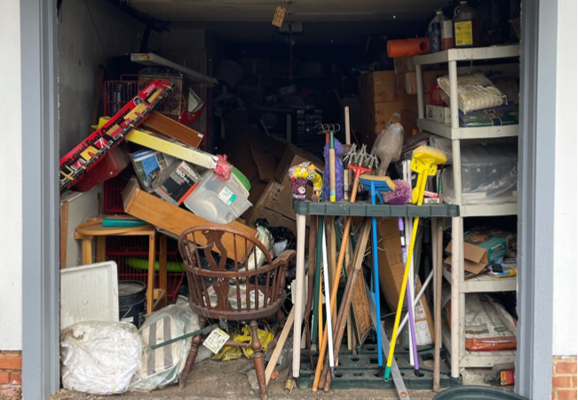 an open garage full of junk