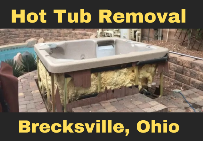 hot tub in a backyard that is missing its front panel with text that reads hot tub removal brecksville, ohio