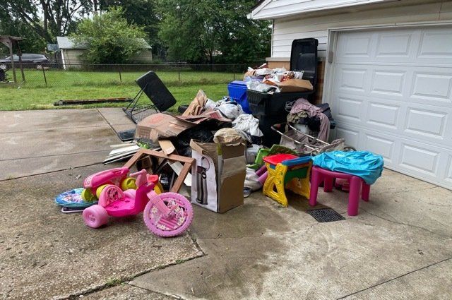Pile of miscellaneous junk in driveway