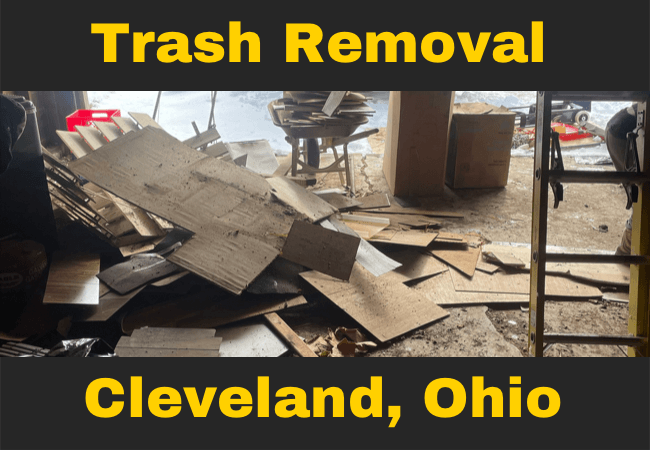 a pile of miscellaneous trash on the garage floor with text that reads trash removal cleveland, ohio