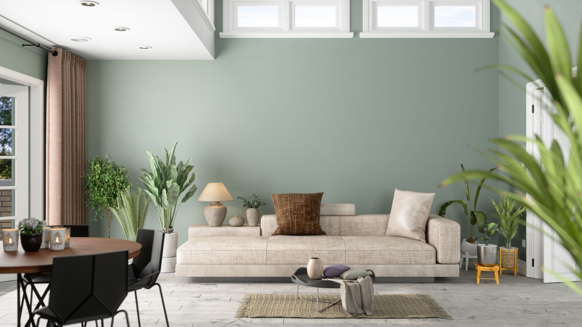 A person is painting a room with a paint roller.