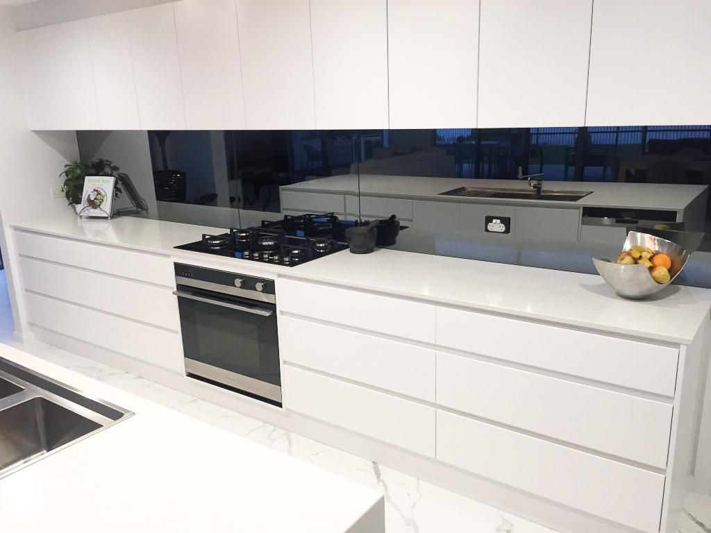 A Kitchen With White Cabinets , A Stove Top Oven , A Sink — Viison Kitchens & Joinery Forster In Forster, NSW